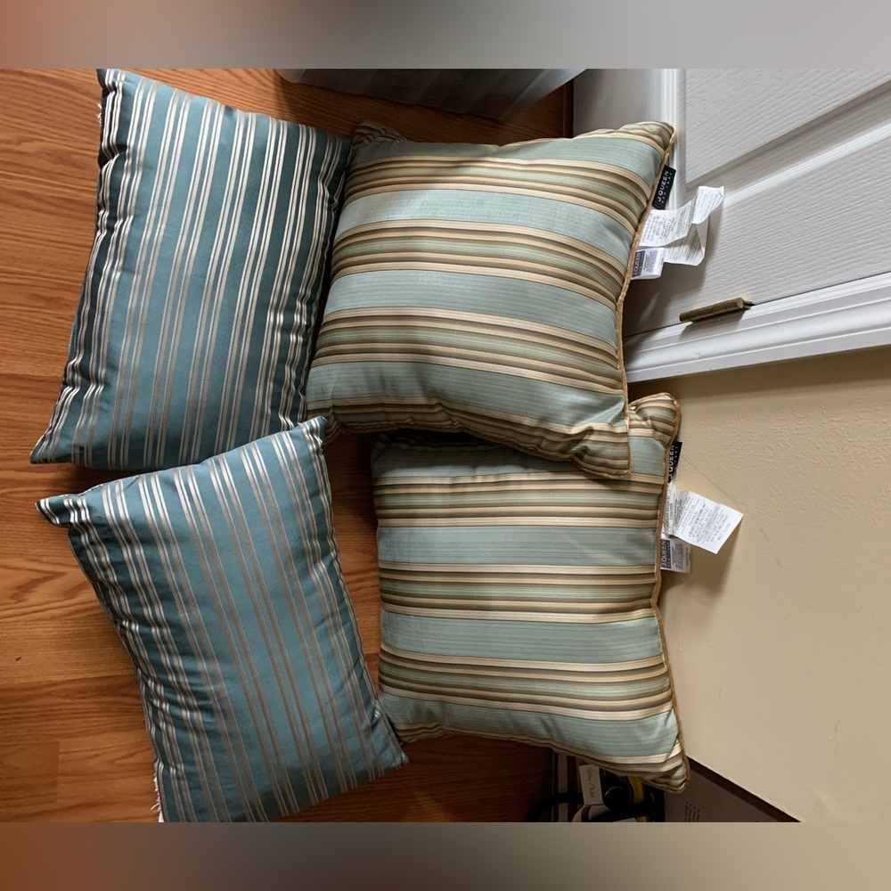 Two J Queen New York (18x18) green/gold pillows and two smaller pillows included